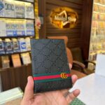 GG strip embossed passport holder