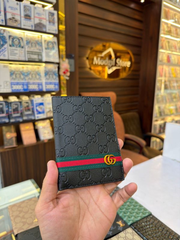 GG strip embossed passport holder