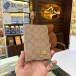 CO beige passport holder