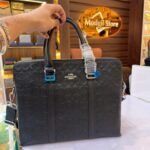 CO embossed laptop bag